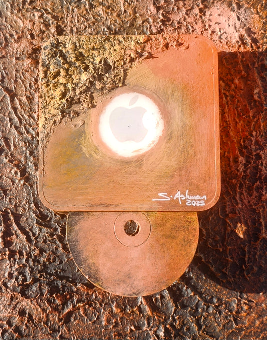 Copper night light with a white bulb on a textured brown surface